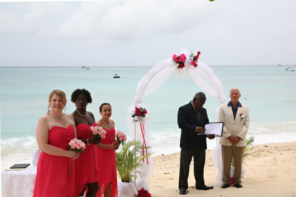 Destination wedding: Couple getting married on the beach. 