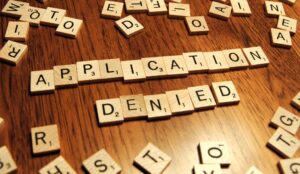 Scrabble letters application denied passport