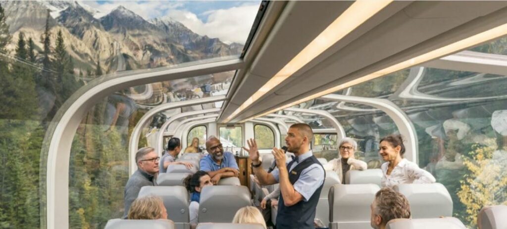 On-train entertainment in the glass dome on luxury train the Rocky Mountaineer.