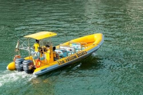 Yellow boat on the water in Dubai