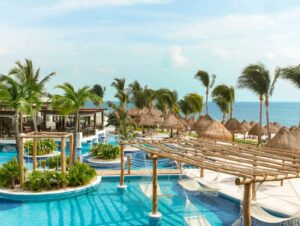 Excellence playa mujeres pool with swning aerial view